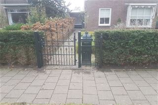 Inlooppoort laten plaatsen als tuinafscheiding in Emmen